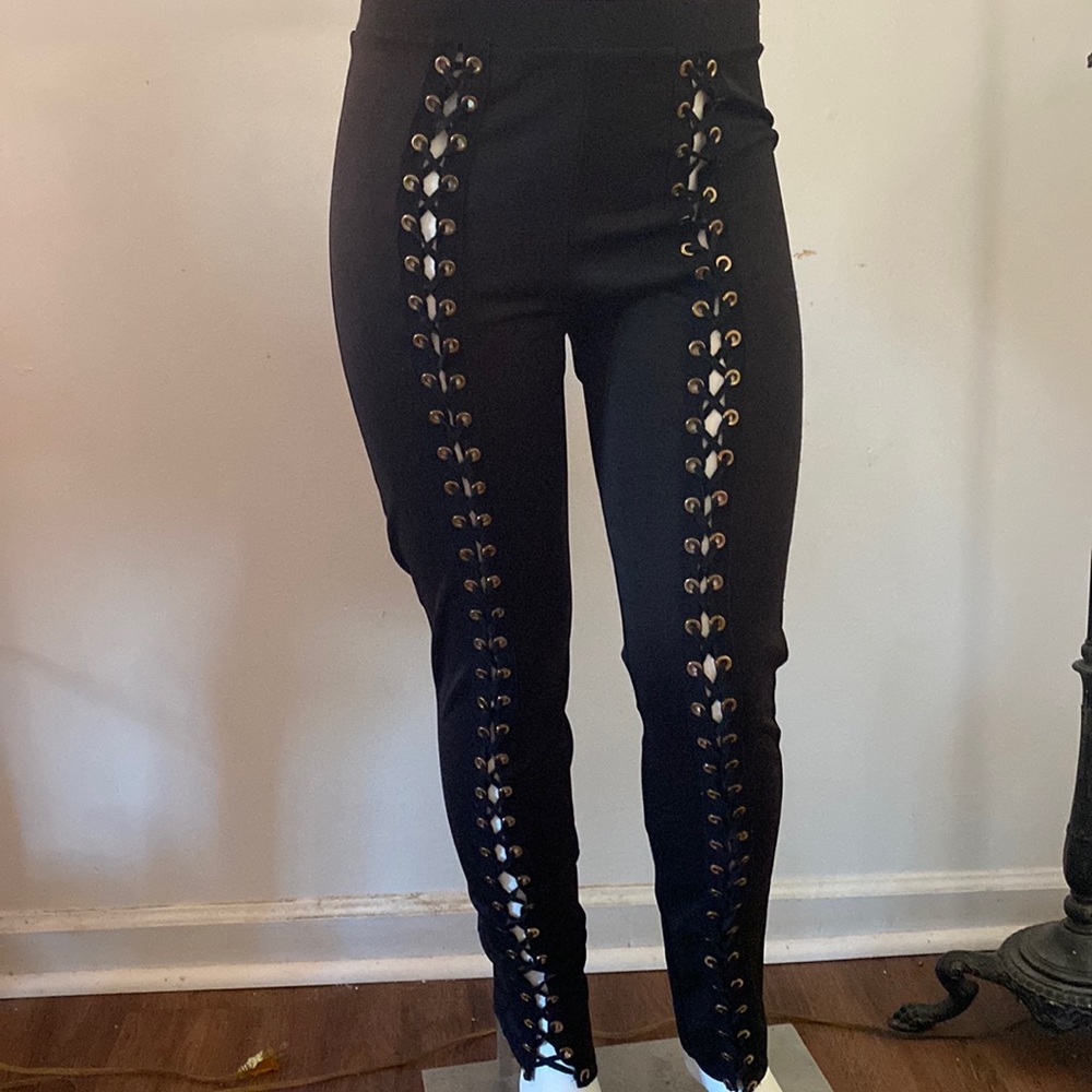 Black leggings with lace up leg look